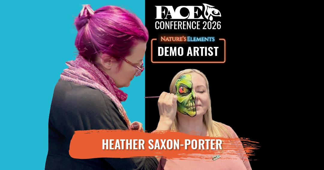 face painter paintin a green skull on a females face